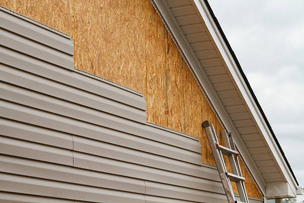 Professional Emergency Siding Repair technician working in Sugarcreek, OH